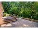 Wooden deck with steps to the yard and railing at 1511 Hatch Rd, Chapel Hill, NC 27516