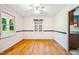 Cozy dining room with hardwood floors, built-in cabinet, and natural light at 1511 Hatch Rd, Chapel Hill, NC 27516