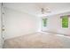 Bright and airy main bedroom with plush carpet and ample natural light at 1511 Hatch Rd, Chapel Hill, NC 27516
