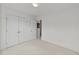 Empty bedroom with a double door closet and ample room for customization at 1725 E Honey Springs Ave, Fuquay Varina, NC 27526