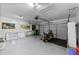 Spacious garage featuring painted walls, and room for a motorcycle and a car at 1725 E Honey Springs Ave, Fuquay Varina, NC 27526