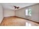 Spacious living room with wood floors, neutral walls, and a ceiling fan at 1732 Farmington Rd, Rocky Mount, NC 27801