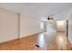 Spacious living room with wood floors, neutral walls, and a ceiling fan at 1732 Farmington Rd, Rocky Mount, NC 27801