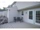 Cozy back deck area with outdoor seating, perfect for relaxing or entertaining guests at 1806 Stroll Cir, Fuquay Varina, NC 27526