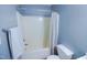 Bathroom featuring shower-tub combo with towel rack at 1806 Stroll Cir, Fuquay Varina, NC 27526