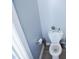 Toilet situated in bathroom with neutral paint and small potted plant at 1806 Stroll Cir, Fuquay Varina, NC 27526
