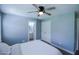 This bedroom offers a glimpse into an ensuite bathroom, enhancing the space's functionality and appeal at 1806 Stroll Cir, Fuquay Varina, NC 27526