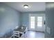 Dining area with table, chairs, and access to the outdoor patio at 1806 Stroll Cir, Fuquay Varina, NC 27526