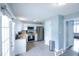 Well-lit kitchen with white cabinets, stainless steel appliances, and butcher block countertops at 1806 Stroll Cir, Fuquay Varina, NC 27526