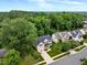 This aerial view showcases a house in a tranquil, wooded neighborhood at 201 Forbes Rd, Wake Forest, NC 27587