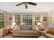 Inviting living room with large windows, comfortable seating, and stylish decor at 201 Forbes Rd, Wake Forest, NC 27587
