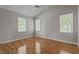 Bedroom featuring vaulted ceiling, ceiling fan, and beautiful hardwood floors at 203 Kronos Lane, Cary, NC 27513