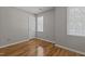 Bedroom with a light hardwood floor and a large closet at 203 Kronos Lane, Cary, NC 27513