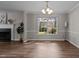 Bright dining room featuring wood flooring, neutral walls, and natural light at 203 Kronos Lane, Cary, NC 27513