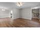 Expansive living area featuring wood floors and neutral paint at 203 Kronos Lane, Cary, NC 27513