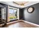 Office space with a view of the yard and a stylish, decorative clock on the wall at 206 Wynngate Dr, Cameron, NC 28326