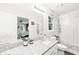 Bathroom featuring granite countertops, white subway tile, and an open doorway to a bedroom at 21 Cedar Hill Dr, Durham, NC 27713