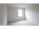 Bedroom featuring neutral carpeting, paint and a window at 2106 Cherry Creek Road Rd, Haw River, NC 27258