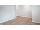 Spacious living room features light gray walls and light wood flooring at 2106 Cherry Creek Road Rd, Haw River, NC 27258