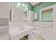 Vintage bathroom with a classic sink, toilet, and cabinet, offering a retro aesthetic at 211 Cool Spring Rd, Durham, NC 27713