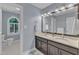 Bathroom with double sinks, granite countertop, and a toilet visible at 2125 Oakcrest Ct, Raleigh, NC 27612