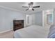 Bedroom features carpet, ceiling fan, closet and a chest of drawers at 2125 Oakcrest Ct, Raleigh, NC 27612