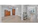 Dining area featuring neutral walls, a chandelier, and light wood flooring at 2125 Oakcrest Ct, Raleigh, NC 27612