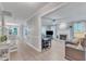 Open-concept floor plan showcases a spacious living room with a fireplace and light flooring at 2125 Oakcrest Ct, Raleigh, NC 27612