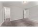 Bedroom featuring a walk-in closet with ample storage space and neutral colored walls at 218 Mason Rd, Durham, NC 27712