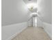 Large attic with carpeted floors and unique lighting at 2202 St Marys St, Raleigh, NC 27608