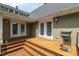 Deck with stairs and stainless steel grill at 2202 St Marys St, Raleigh, NC 27608