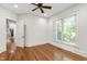 Bedroom boasts natural light from windows, hardwood floors and neutral walls at 2202 St Marys St, Raleigh, NC 27608