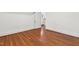 Bedroom features hardwood flooring and white trim at 2202 St Marys St, Raleigh, NC 27608
