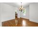 Bright dining room with hardwood floors and modern chandelier at 2202 St Marys St, Raleigh, NC 27608