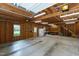 Unfinished three-car garage interior with a workbench and storage space, ready for customization at 2202 St Marys St, Raleigh, NC 27608