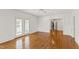 Spacious living room with French doors and hardwood floors at 2202 St Marys St, Raleigh, NC 27608