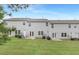 Townhome backyard, grass lawn, and rear exterior of the unit, featuring green space at 222 Explorer Dr # 271, Morrisville, NC 27560