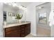 Bathroom featuring a double vanity with granite countertops, creating a spa-like retreat at 222 Explorer Dr # 271, Morrisville, NC 27560