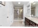 Bathroom featuring a glass shower enclosure and a granite vanity with lots of storage at 222 Explorer Dr # 271, Morrisville, NC 27560