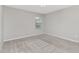 Light-filled bedroom with plush carpeting, white trim, and a window with natural light at 222 Explorer Dr # 271, Morrisville, NC 27560