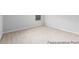 Light-filled bedroom boasts plush carpet and neutral walls, creating a cozy, inviting space at 222 Explorer Dr # 271, Morrisville, NC 27560