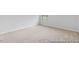Bright bedroom features neutral carpet, light gray walls, and a window for natural light at 222 Explorer Dr # 271, Morrisville, NC 27560