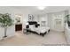 Bright bedroom with large windows, plush carpeting, and access to the en-suite bathroom at 222 Explorer Dr # 271, Morrisville, NC 27560