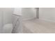 Spacious carpeted bonus room with light gray walls and trim, bright and airy at 222 Explorer Dr # 271, Morrisville, NC 27560