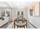Well-lit dining room with a modern table and chairs, perfect for gatherings and Gathering meals at 222 Explorer Dr # 271, Morrisville, NC 27560