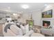 Stylish living room with an open layout, a fireplace, and seamless flow to the kitchen and dining areas for easy entertaining at 222 Explorer Dr # 271, Morrisville, NC 27560