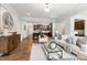 Open living room with hardwood floors and bright, neutral decor at 222 Explorer Dr # 271, Morrisville, NC 27560