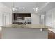 Modern kitchen features stainless steel appliances, granite countertops, and stylish pendant lighting at 222 Glenwood Ave # 714, Raleigh, NC 27603
