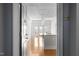 A bright, open kitchen leads into a living space with beautiful flooring and recessed lighting at 222 Glenwood Ave # 714, Raleigh, NC 27603