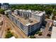 Overhead angle on parking structure highlighting access to rail lines and ample resident parking at 222 Glenwood Ave # 714, Raleigh, NC 27603